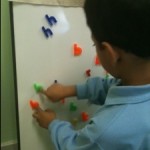 Students sort out and learn about letters and words.